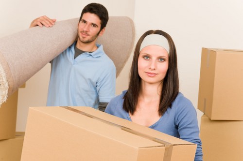 Movers safely carrying items for a Kingstonvale small relocation